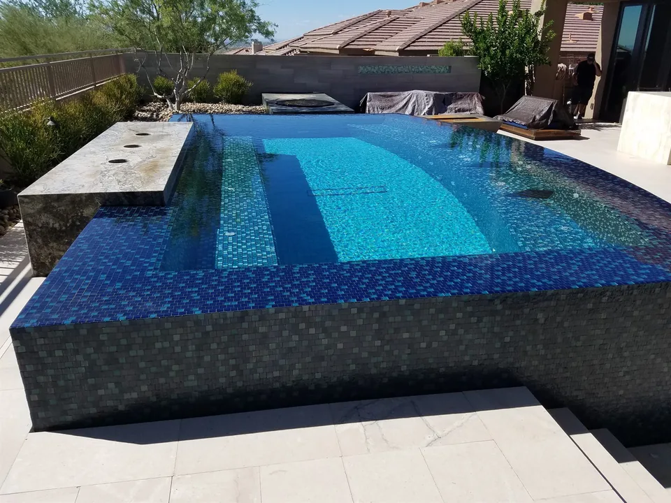 Spa walls, waterline tile, and clean visual edges